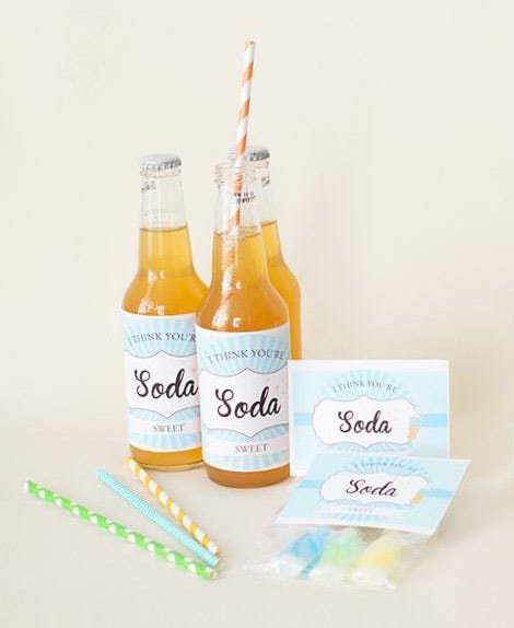 Soda bottles with blue Soda Shoppe Wrappers and gift tags