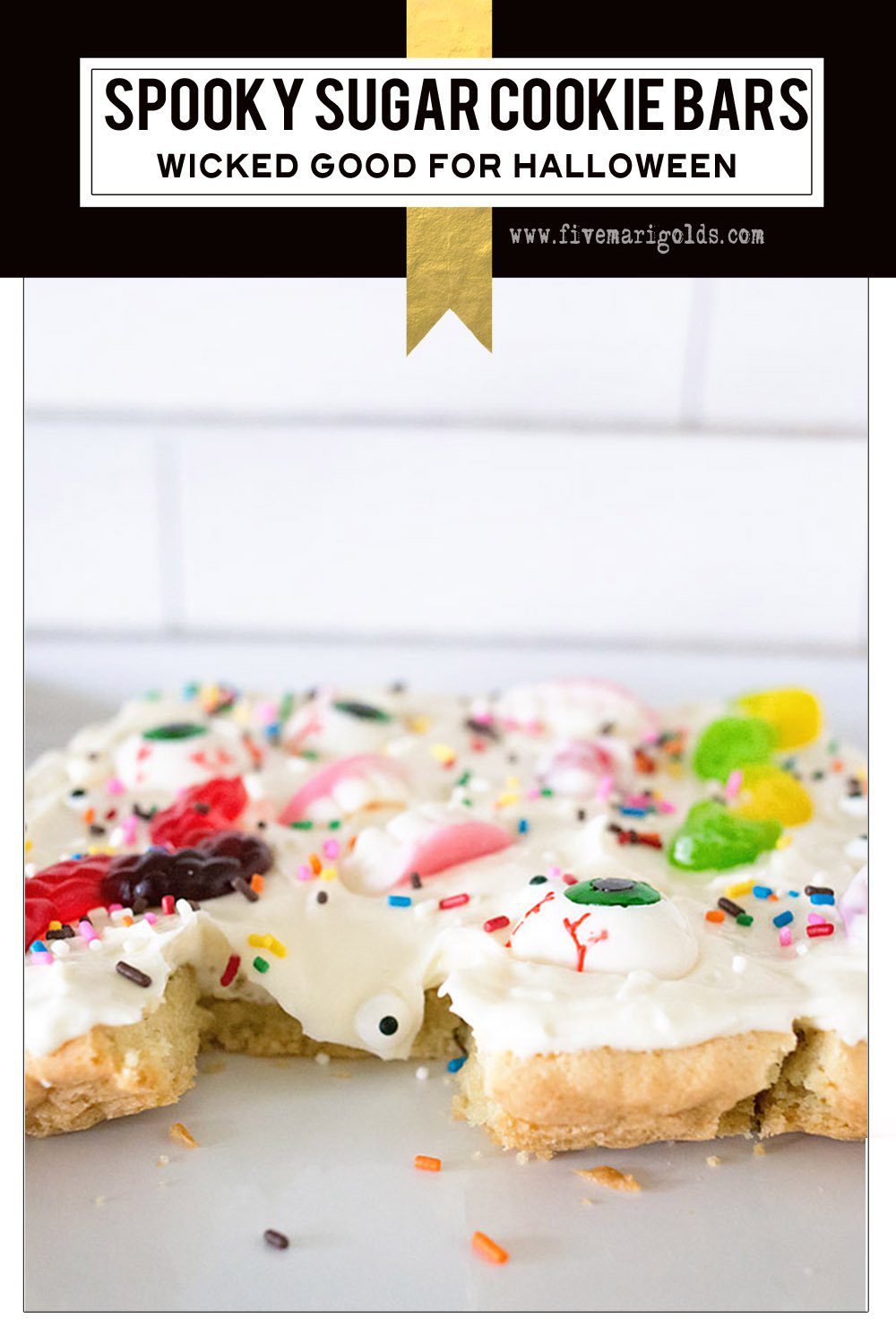Spooky and Sweet, these sugar cookie bars are perfect for your Halloween party!