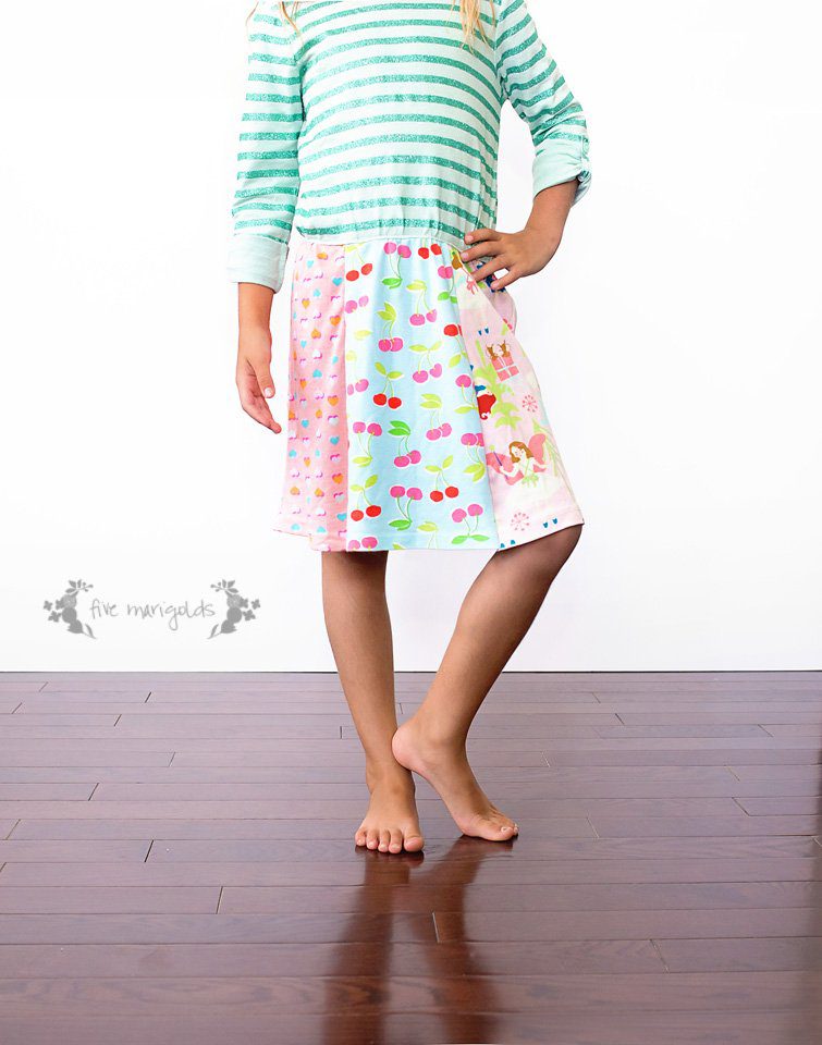 Such a good idea! Refashion upcycled T-shirts to create a custom knit dress for little girls. Upcycled t-shirt dress tutorial| Five Marigolds