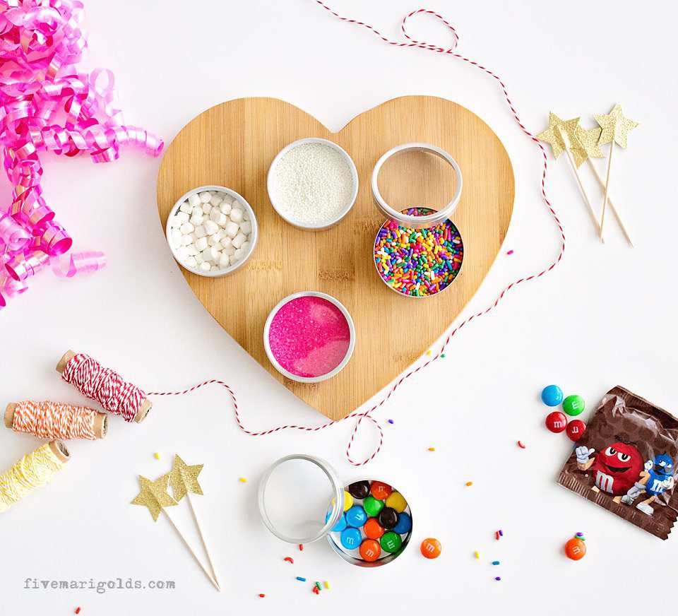 Great family gift idea: DIY cookie decorating kit. Include sugar cookies or gingerbread, frosting, and sprinkles. #MerryAndBright #ad