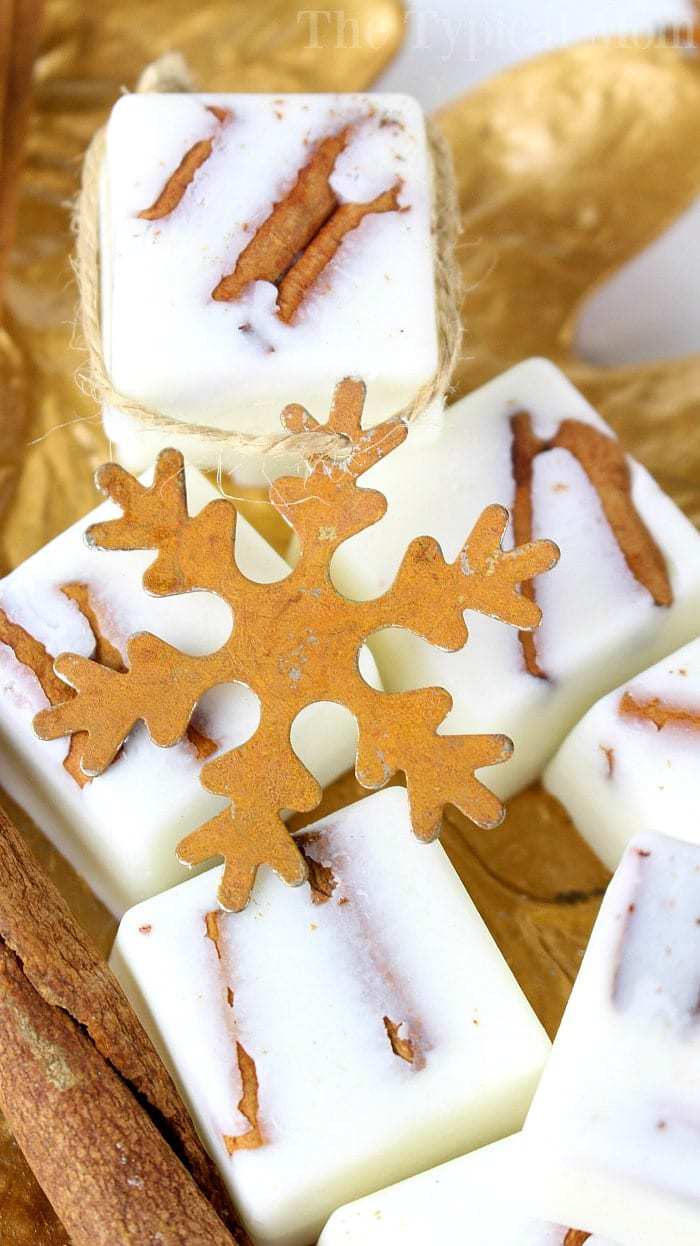 Square homemade lotion bars with brown snowflake on top